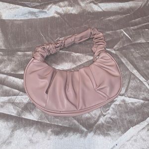 Pink ruched baguette bag